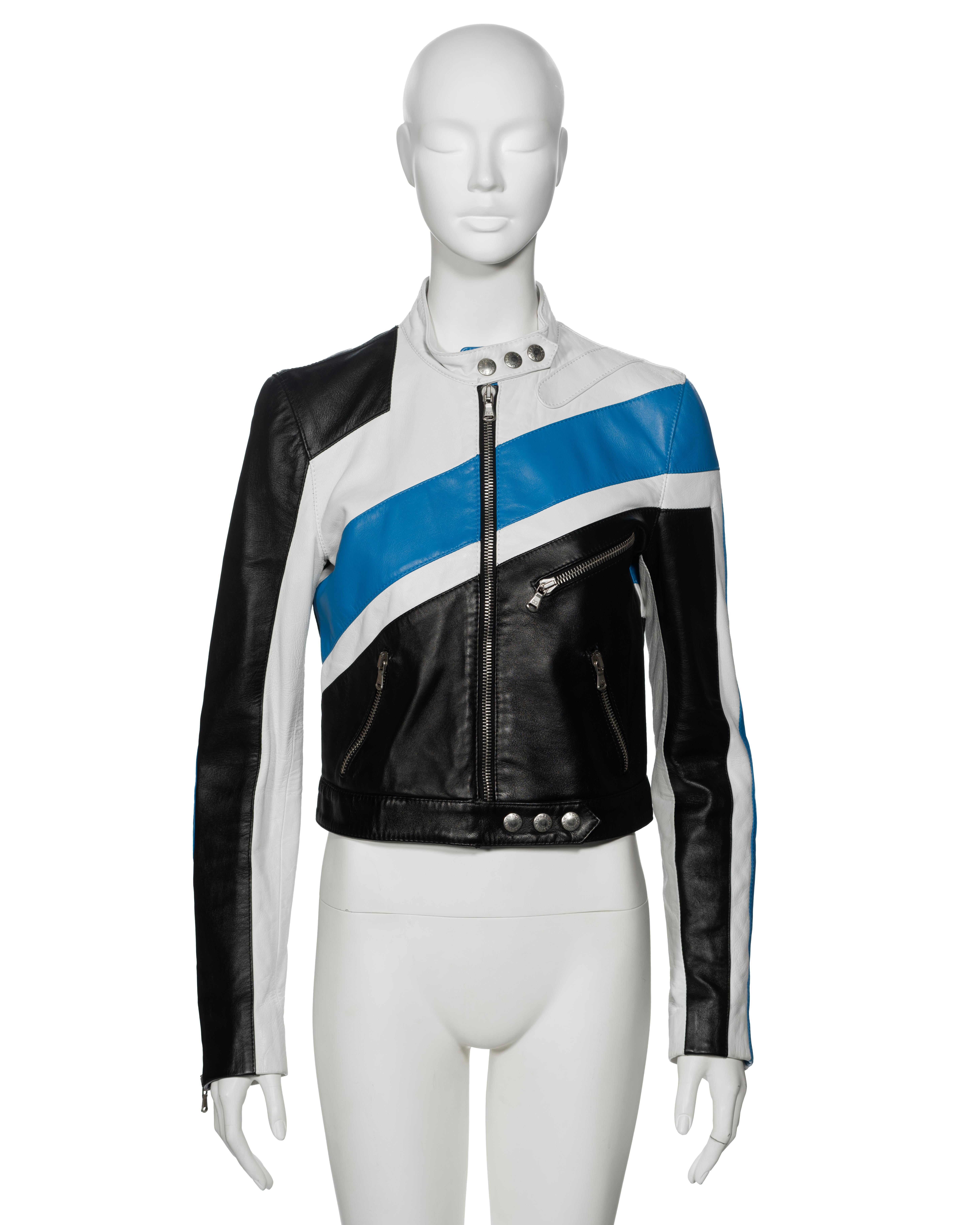 ▪ Archival Dolce & Gabbana Tri-Colour Leather Racer Jacket
▪ Spring-Summer 2001
▪ Sold by One of a Kind Archive
▪ Crafted from multi-panelled leather in a striking combination of blue, black, and white
▪ Boasts a cropped silhouette
▪ Featured
