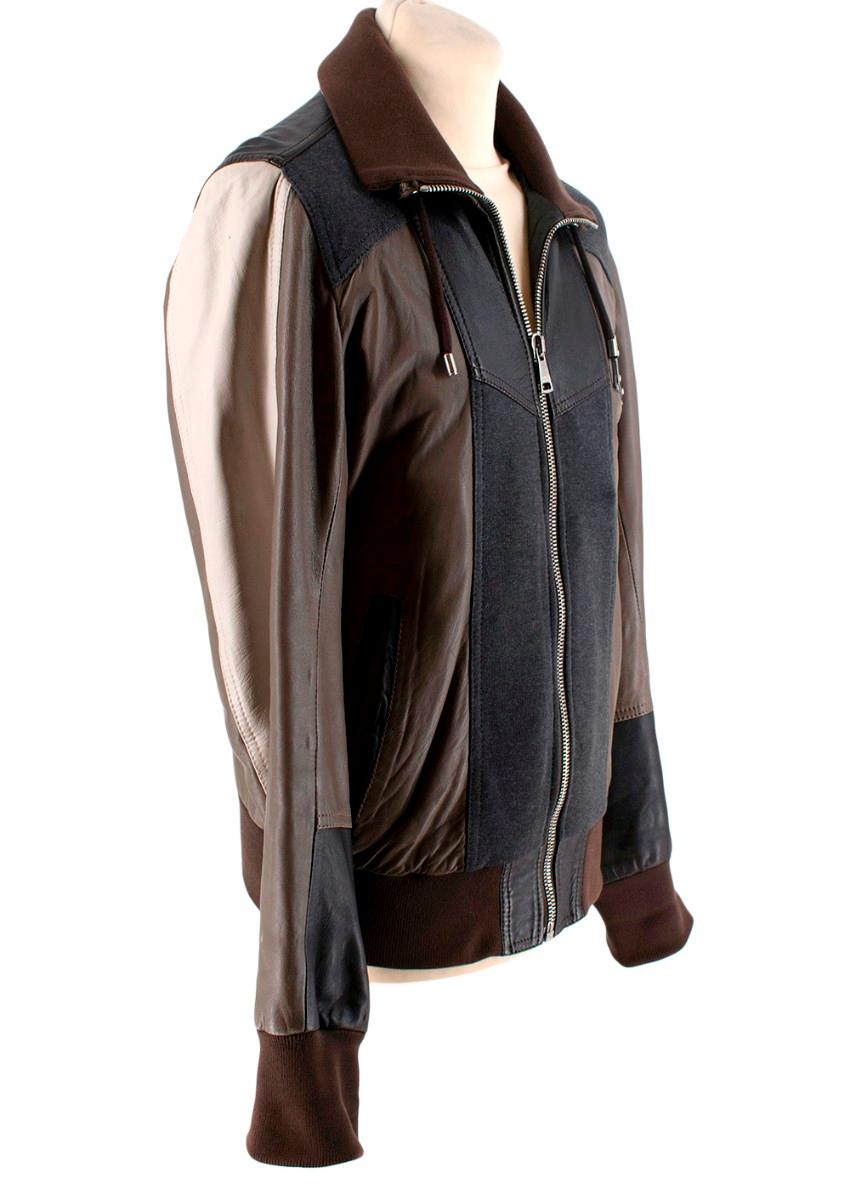 Dolce & Gabbana Tricolour Dark Brown Leather Jacket
 

 - Colour block butter smooth leather jacket in taupe, cream and dark brown tone panels
 - Ribbed brown cuffs, funnel collar and hem
 - Silver-tone zipped front closure
 - Two front slip pockets