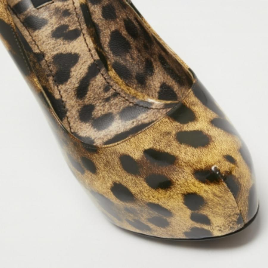 Dolce & Gabbana Bombas de plataforma de lona revestida en dos tonos con estampado de leopardo Talla 39.5 Marrón en venta