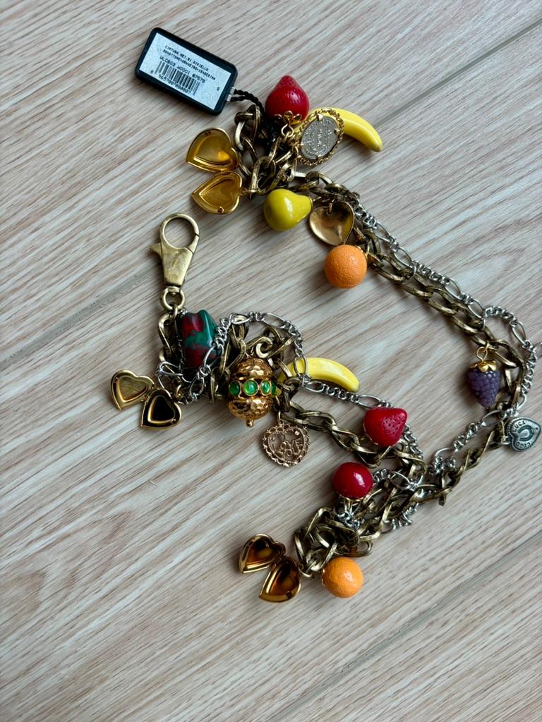 Dolce & Gabbana
Not sure of the year
Two-tone silver and antiqued gold belt
Can also be worn as a long necklace or doubled
Fruit, vegetable, hearts (functioning lockets), and other charms
NWT's flawless
Size Small
At smallest length can be whatever