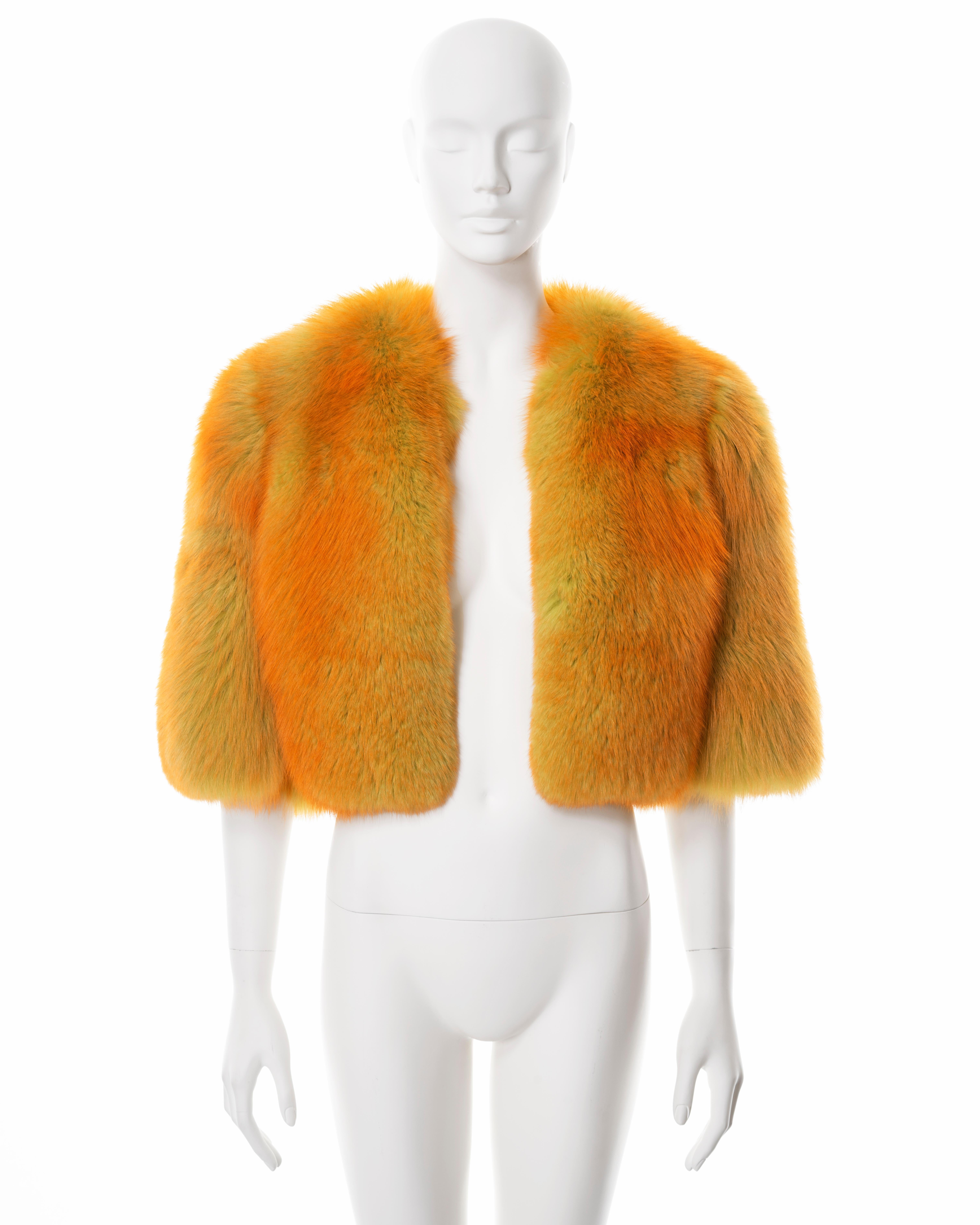 ▪ Dolce & Gabbana fur jacket
▪ Sold by One of a Kind Archive
▪ Constructed from orange dyed fox fur with lime undertones  
▪ Cropped length and sleeves 
▪ Silk leopard print lining 
▪ Front hook closure 
▪ IT 42 - FR 38 - UK 10 - US 6
▪ Made in