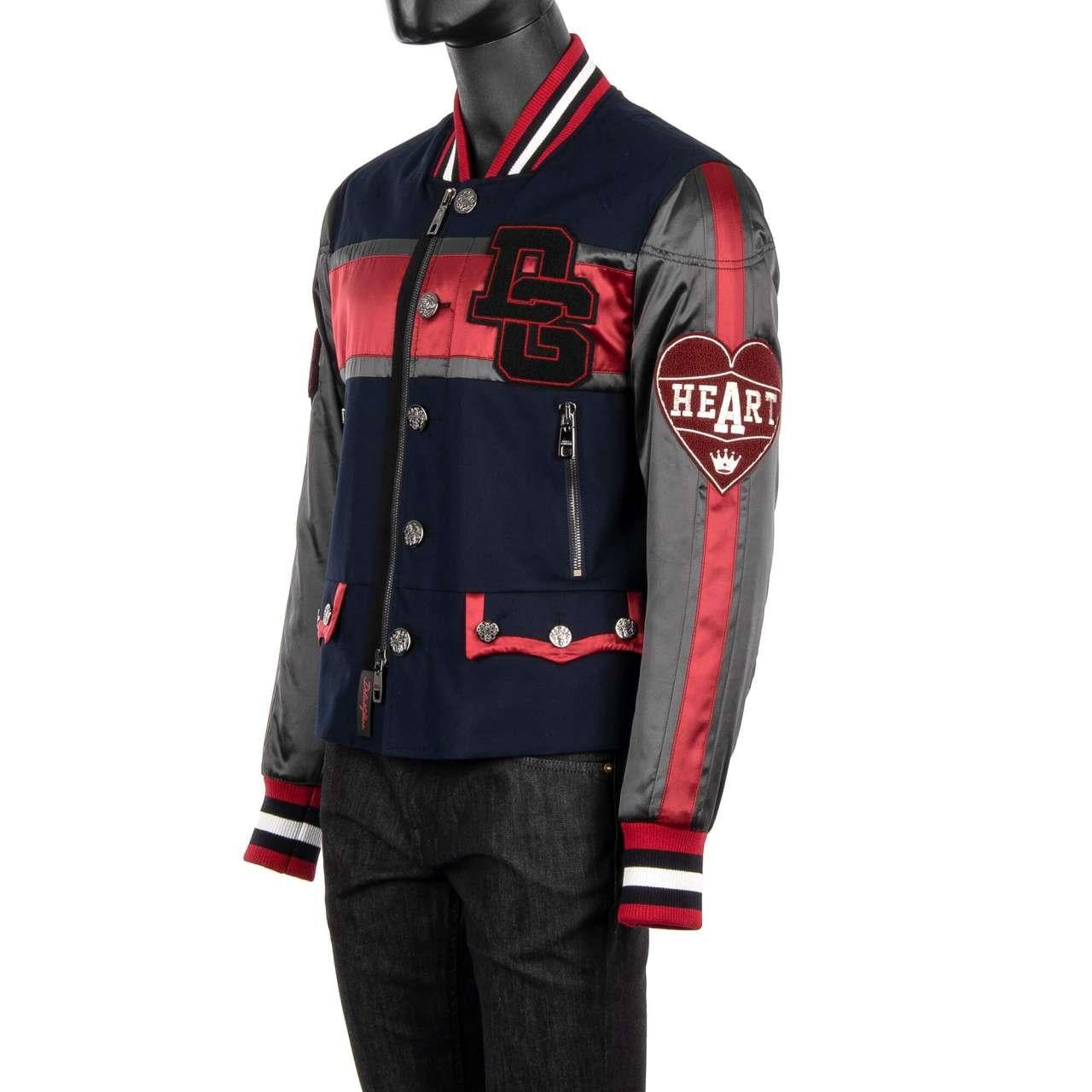 - Varsity / College Jacket with DG Logos, embroidery, applications, decorative buttons and pockets by DOLCE & GABBANA - New with tag - Former RRP: EUR 2.450 - Regular cut - MADE IN ITALY - Model: G9KY0Z-FUFGI-B3681 - Material: 67% Cotton, 19%
