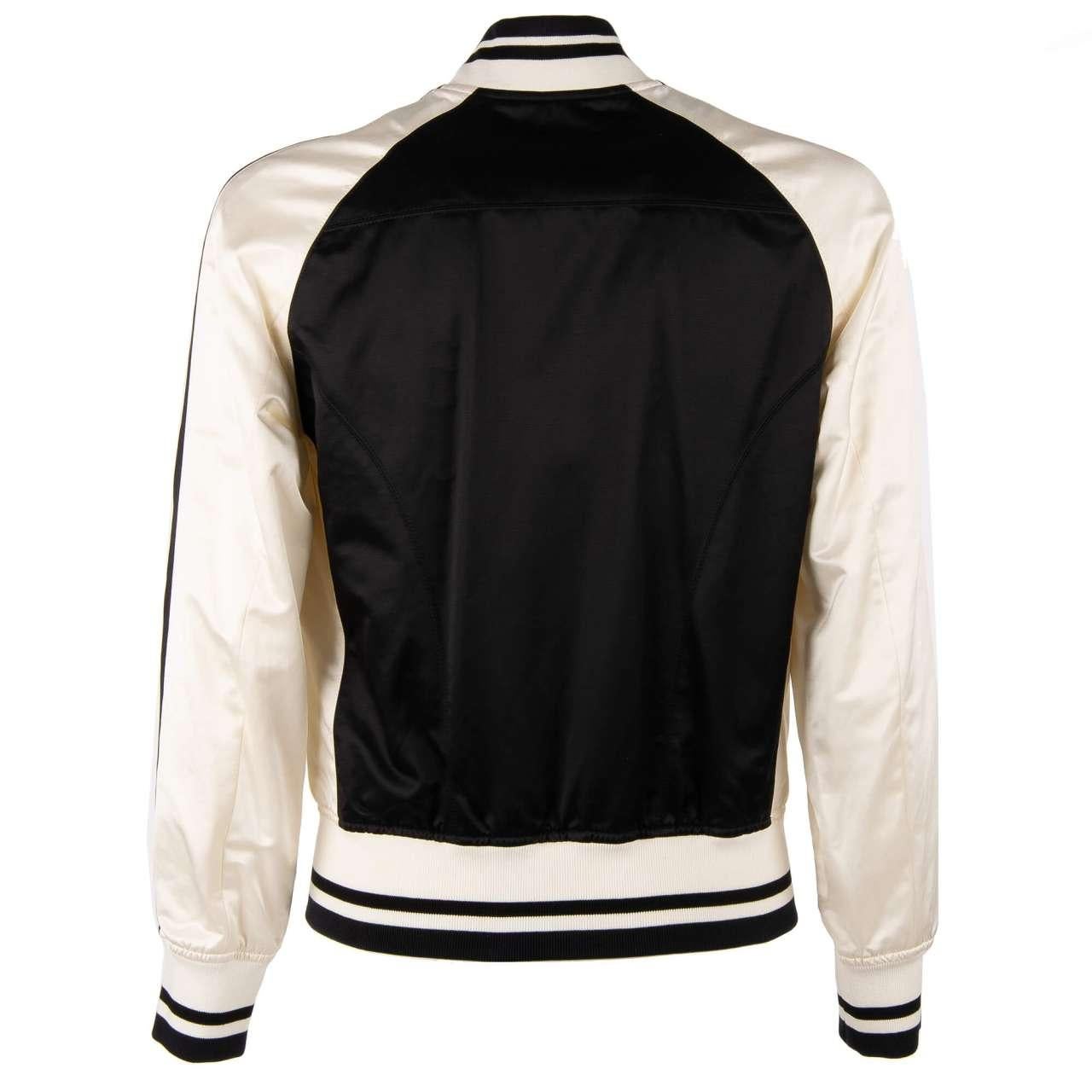 - Varsity / College Jacket with embroidered DG Logo, zip closure, knitted details and pockets with zip closure by DOLCE & GABBANA - New with tag - Former RRP: EUR 1.850 - Regular cut - MADE IN ITALY - Model: G9JW1Z-FUMDQ-B0665 - Material: 57%