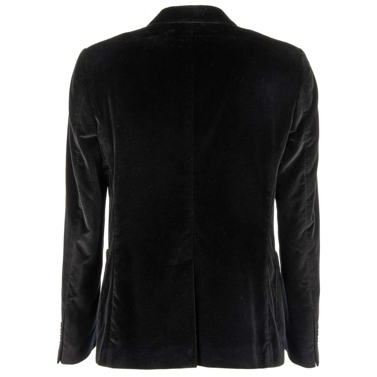 - Velvet blazer with inside crown logo embroidery, peak lapel and pockets in black by DOLCE & GABBANA - Former RRP: EUR 1,550 - Made In Italy - New with Tag - Slim Fit - Model: G2KN7Z-FUVG7-N0000 - Material: Velvet, 95% Cotton, 3% Polyester, 2% Silk