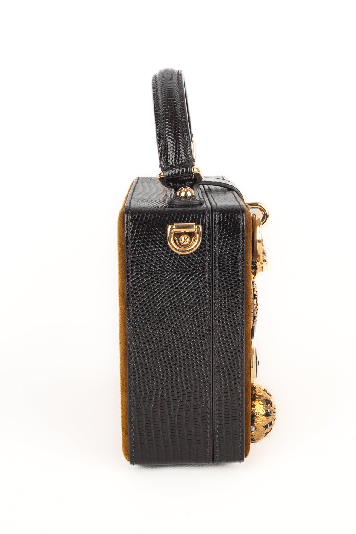 Dolce & Gabbana - (Made in Italy) Velvet box bag with cocoa leather embossed in a lizard way, ornamented with different buttons. Removable handle and strap.

Additional information:
Condition: Very good condition
Dimensions: Length: 19 cm - Height: