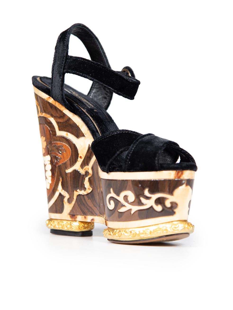 CONDITION is Very good. Minimal wear to the sandals is evident. Small abrasions to the front and back of both shoes and light scratches to the right side of the right shoe on this used Dolce & Gabbana designer resale item.
 
 
 
 Details
 
 
