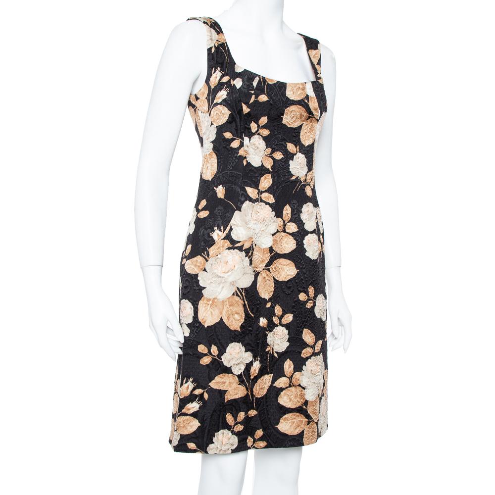 From the house of Dolce & Gabbana, this dress is a treasured creation. A classic black dress like this can be effortlessly styled with some statement piece for a knockout evening look. Brilliantly made from a wool and silk blend, this floral printed