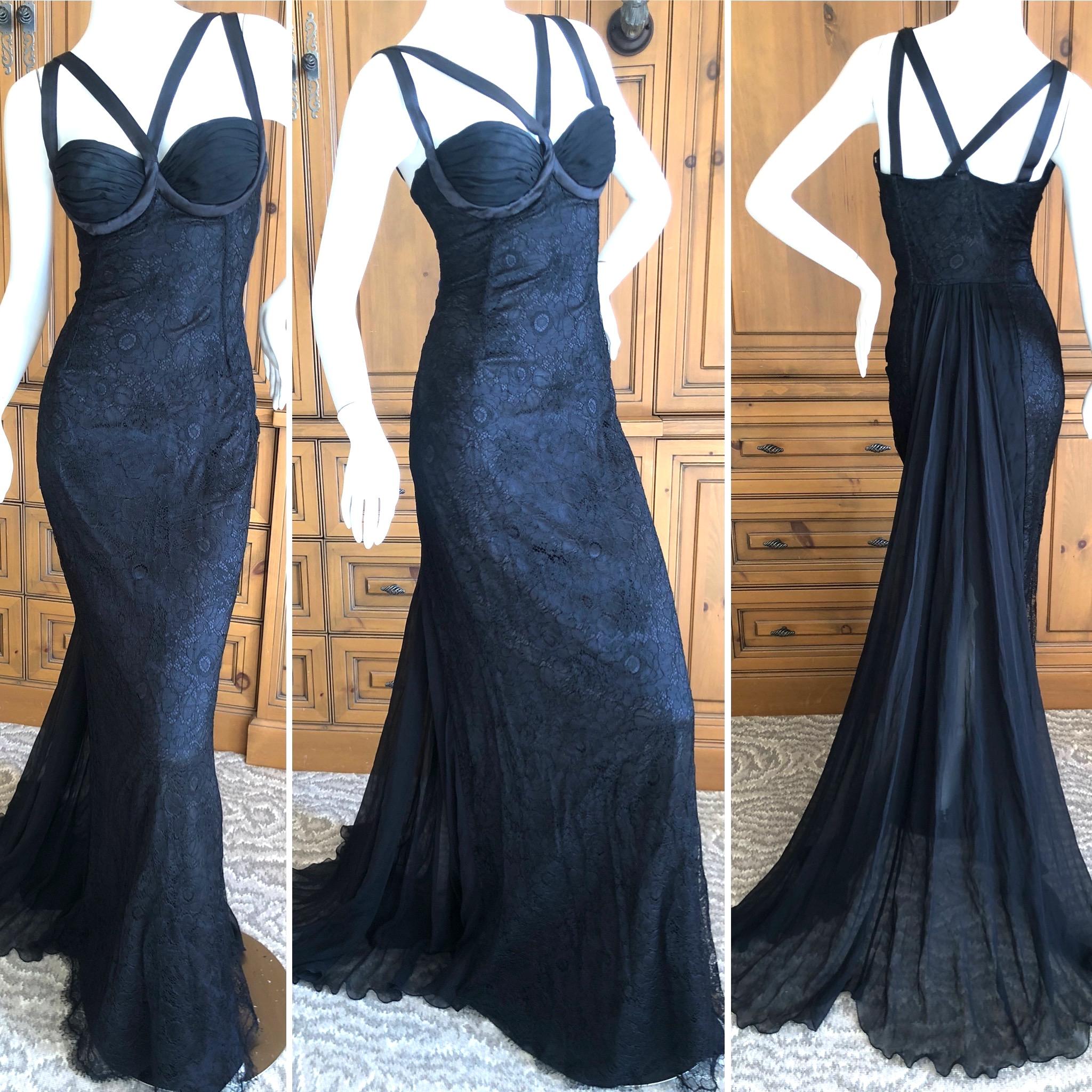Dolce & Gabbana Vintage Black Lace Corset Evening Gown with Train.
This is so wonderful, so sexy. the photos don't do it justice.
Size 42
 Bust 36