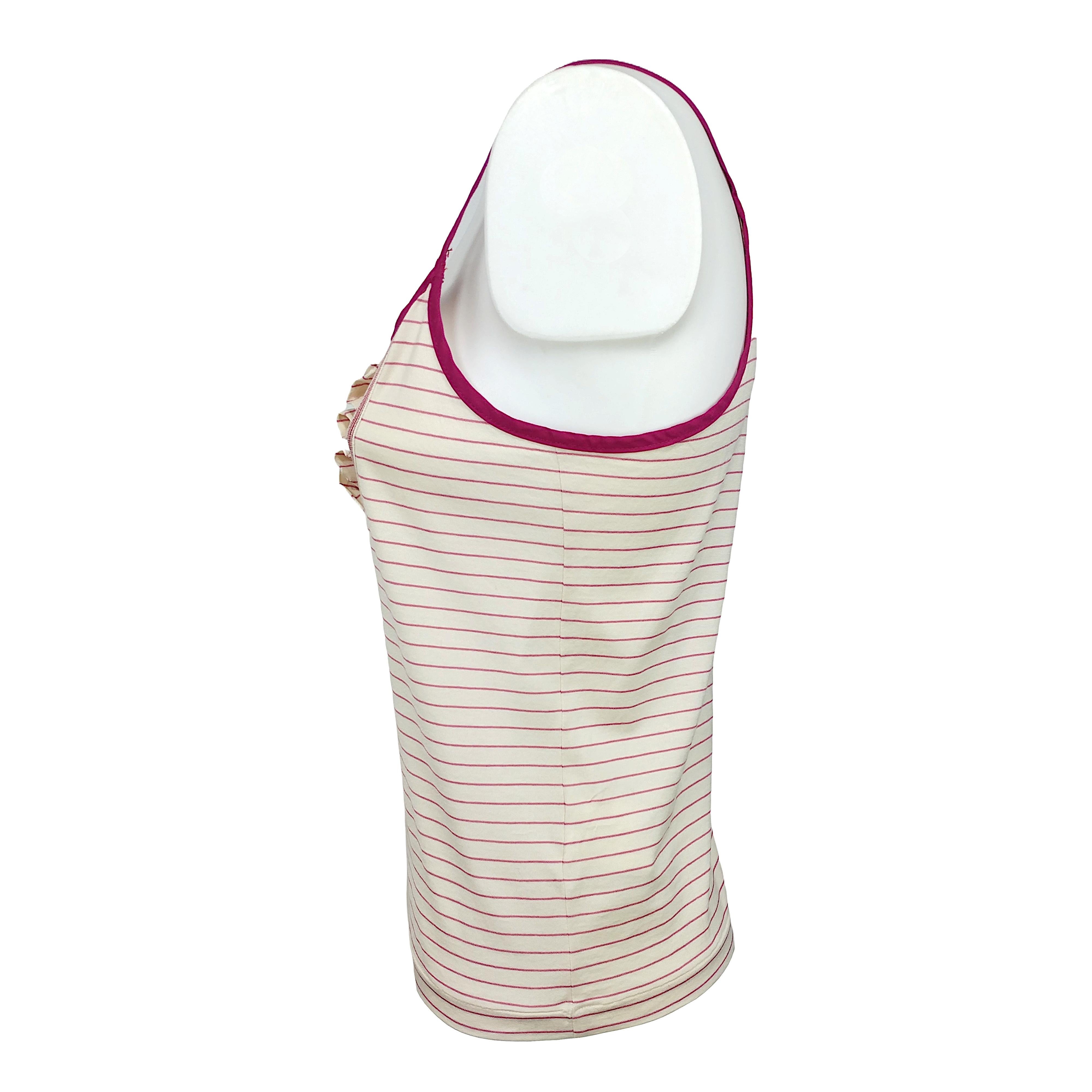 Introducing a refined tank top from D&G, crafted in stretch cotton with purple stripes on an ecru white background. This summer essential combines style and comfort effortlessly. The round neckline adds a classic touch, while the subtle ruffles on