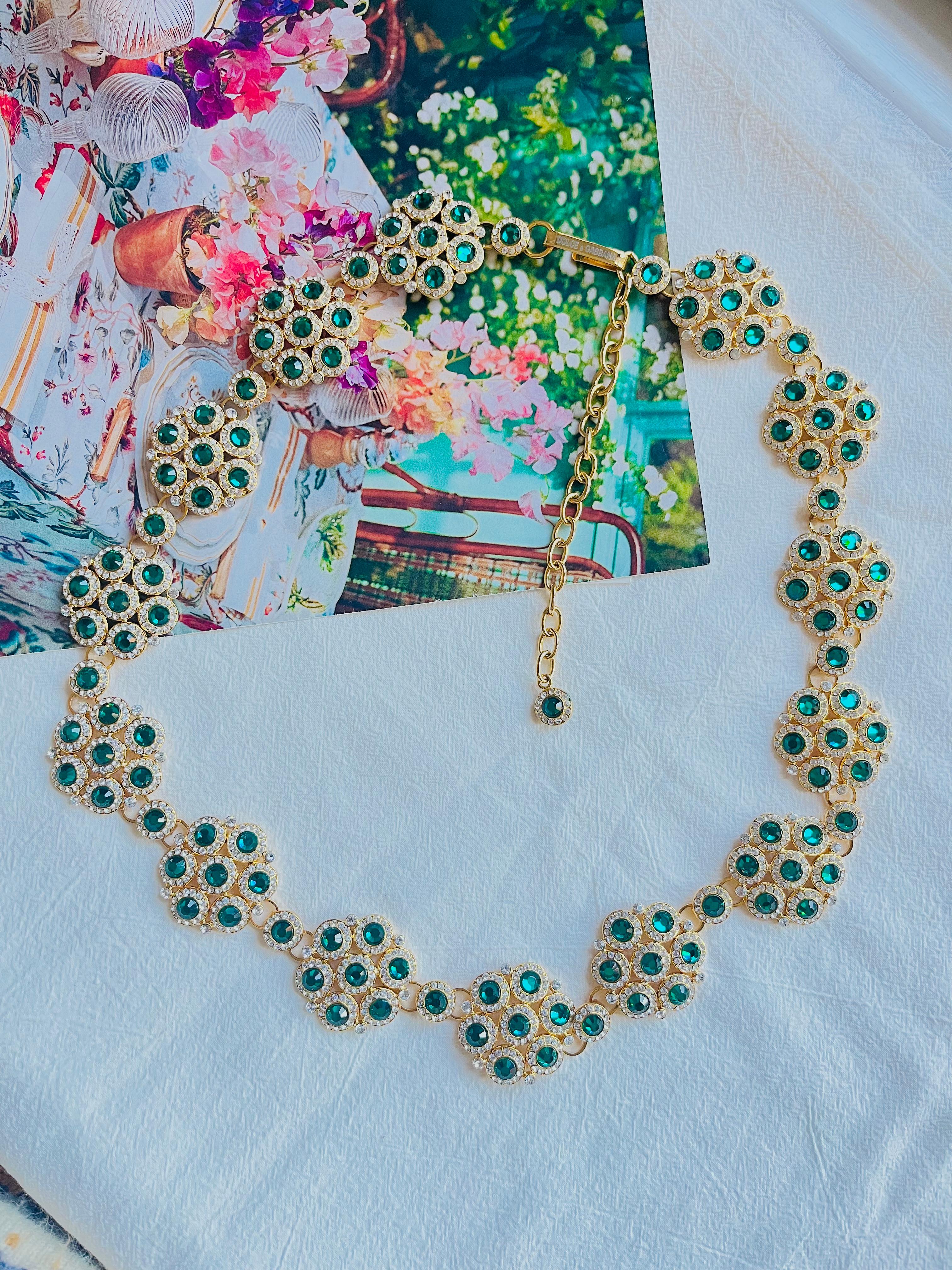 DOLCE & GABBANA Vintage Emerald Green Crystals Floral Interlock Belt Necklace, Gold Plated

Very excellent condition. 100% Genuine.  Can be used as a long necklace.

A very beautiful belt by DOLCE & GABBANA. Rare to find. Come with original