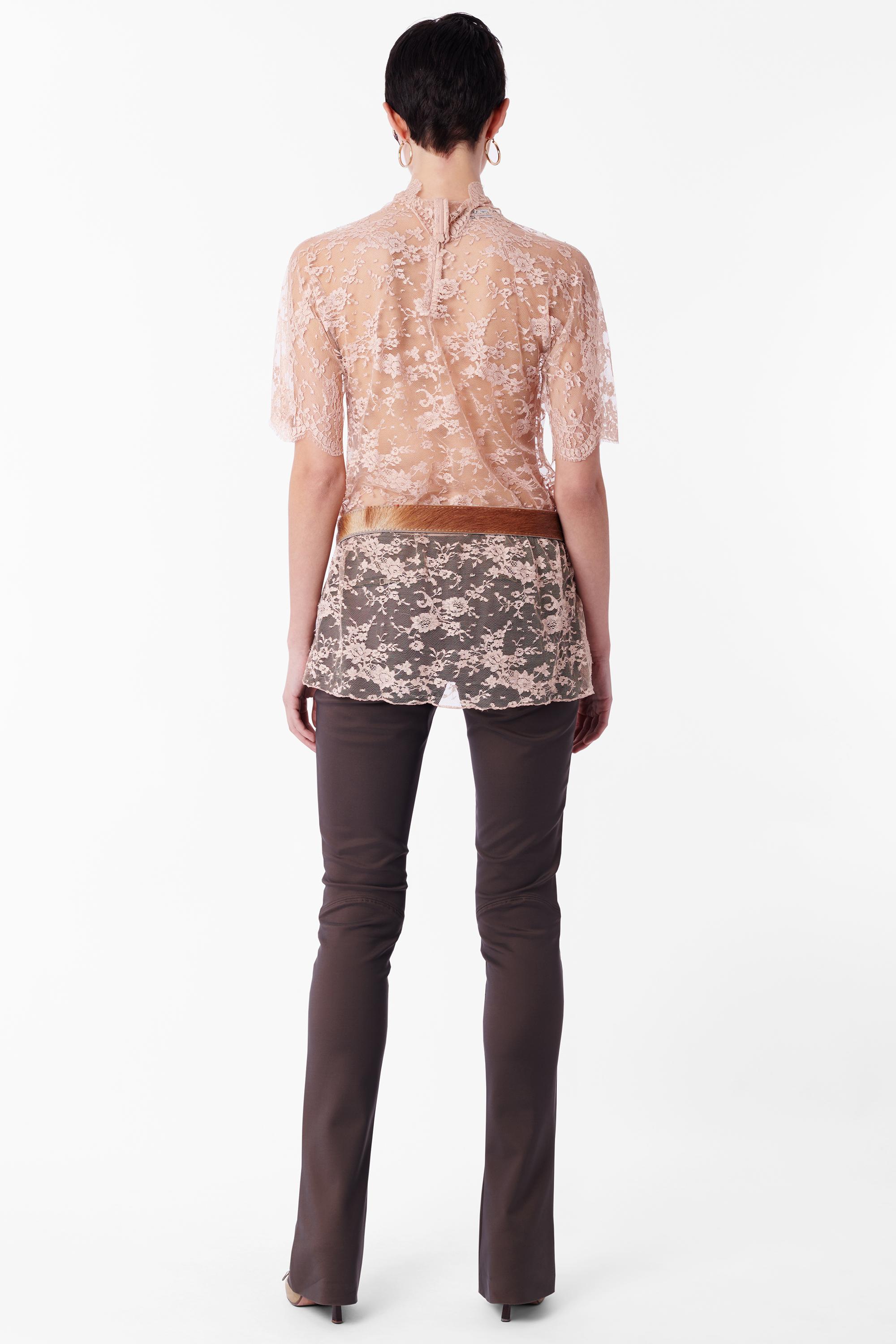 Vintage Dolce & Gabbana Fall Winter 2001 dust pink lace top. Features allover floral lace print, short capped sleeves with ‘raw’ hem, zip back closure, high neck, and shift fit. In great vintage condition - minor tear on top shoulder. 
Brand: Dolce