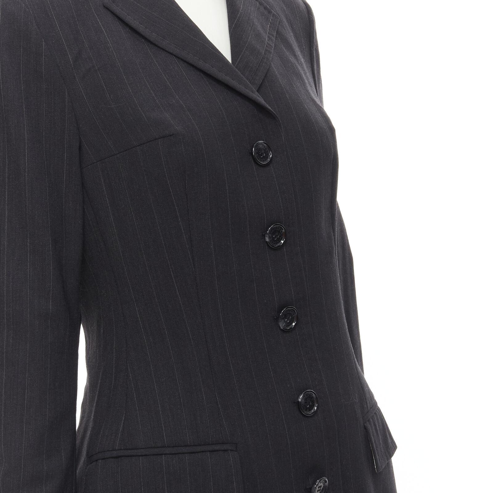 DOLCE GABBANA Vintage grey pinstripe wool blend blazer skirt set IT42 M
Reference: GIYG/A00185
Brand: Dolce Gabbana
Designer: Domenico Dolce and Stefano Gabbana
Material: Wool, Blend
Color: Grey
Pattern: Pinstriped
Closure: Button
Extra Details: