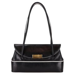 Sac à bandoulière vintage en cuir Dolce & Gabbana avec passepoil contrasté