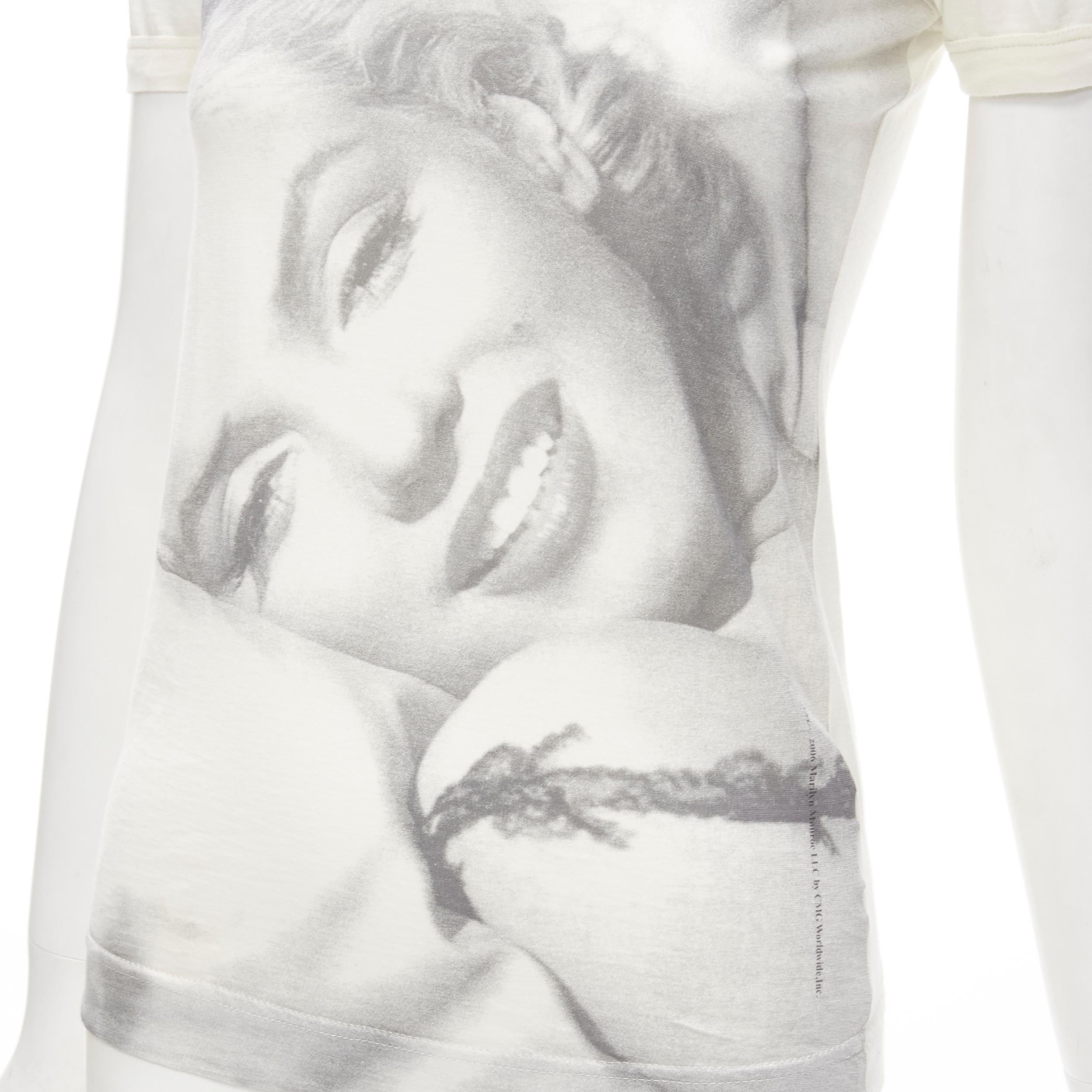DOLCE GABBANA Vintage Marilyn Monroe Y2K photo print cotton tshirt IT36 XS 
Reference: ANWU/A00635 
Brand: Dolce Gabbana 
Collection: Marilyn Monroe 
Material: Feels like cotton 
Color: Cream 
Pattern: Marilyn Monroe 
Made in: Italy 


CONDITION: