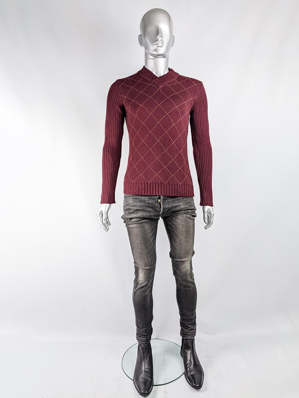 A stylish vintage mens jumper from the 90s by Dolce & Gabbana for their mainline. In a wine red virgin wool with a diamond pattern intarsia knit through the front and ribbed sleeves and back. 

Size: Not indicated; fits like a men's Small. Please