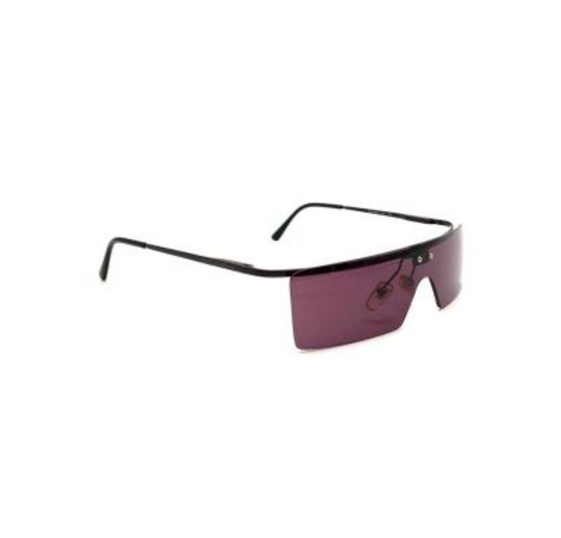 Dolce & Gabbana Vintage pink lens sunglasses

-Rectangle shape 
-Not rimmed 
- Logo on temples 
-Black metal

Material: 

Acetate 
Metal 

Made in Italy 

9.5/10 excellent conditions, please refer to images for further details. 

PLEASE NOTE, THESE