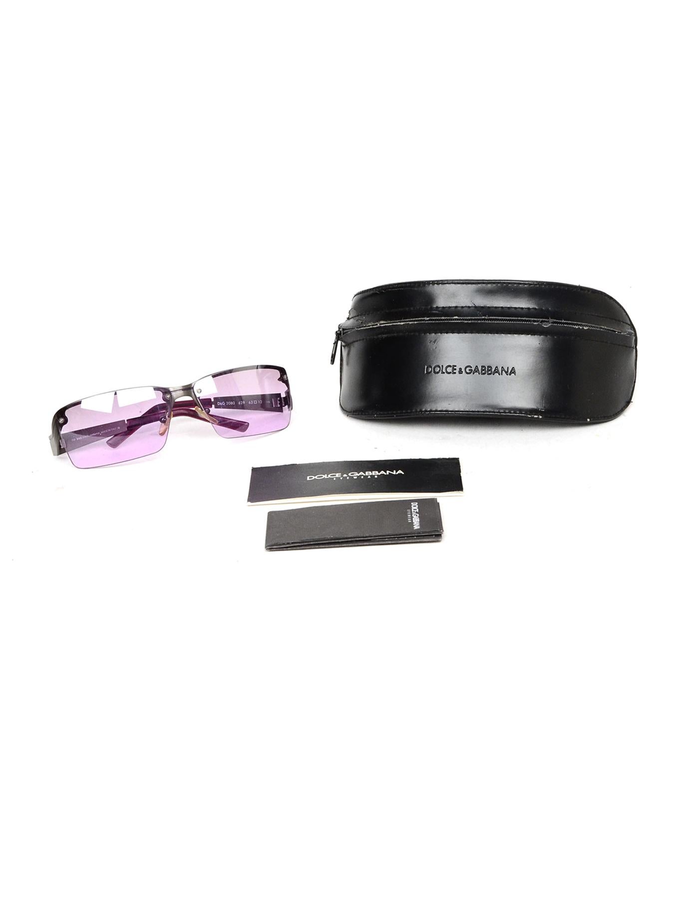 Dolce & Gabbana Vintage Purple Lens Sunglasses

Made In: Italy 
Year of Production: Vintage
Color: Purple, gunmetal
Hardware: Gunmetal
Materials: Metal
Overall Condition: Excellent vintage, pre-owned condition with exception of minor marks in lenses