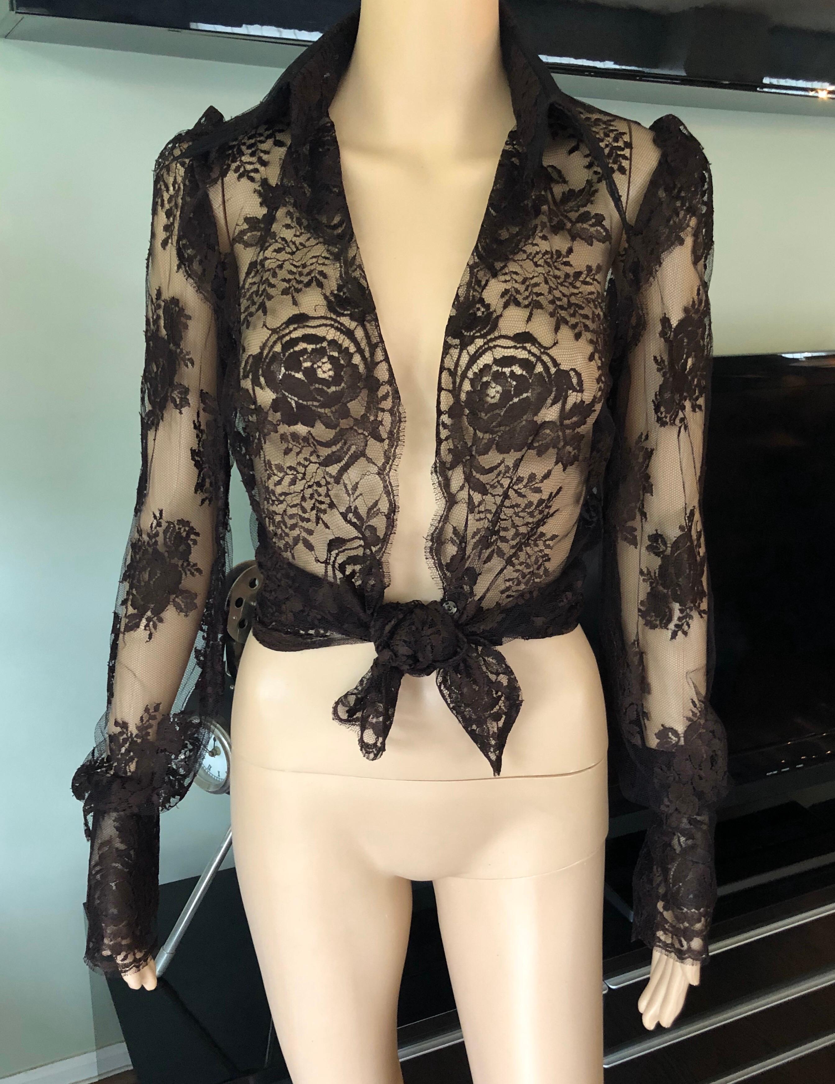 Dolce & Gabbana Vintage Sheer Lace Long Sleeve Brown Shirt Top IT 40

Dolce & Gabbana lace top with pointed collar, long sleeves and snap closures at front.
