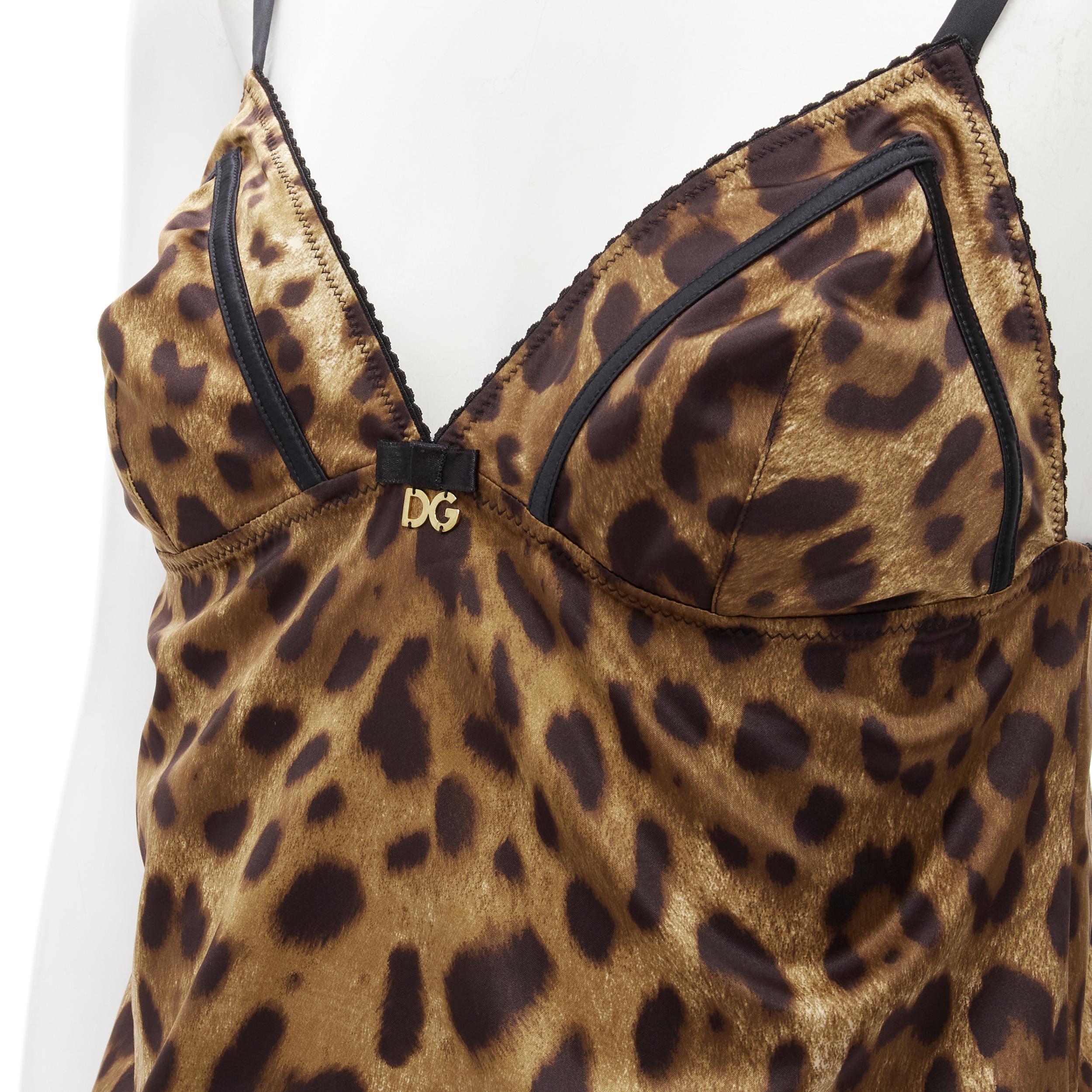 DOLCE GABBANA Vintage Y2K gold DG charm leopard camisole tank top L 
Reference: TGAS/C01250 
Brand: Dolce Gabbana 
Collection: Underwear line 
Material: Polyester 
Color: Brown 
Pattern: Leopard 
Extra Detail: Gold-tone DG charm with black bow at