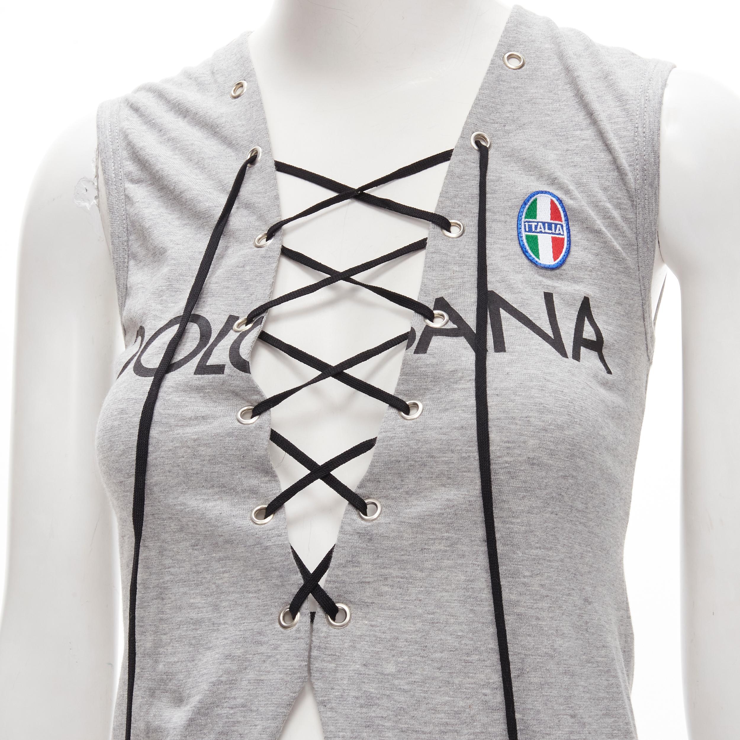 DOLCE GABBANA Vintage Y2K grey logo lace up tank top IT38 XS Kim Kardashian 
Reference: ANWU/A00621 
Brand: Dolce Gabbana 
As seen on: Kim Kardashian 
Material: Cotton 
Color: Grey 
Pattern: Solid 
Closure: Lace Up
Extra Detail: Silver-tone grommet