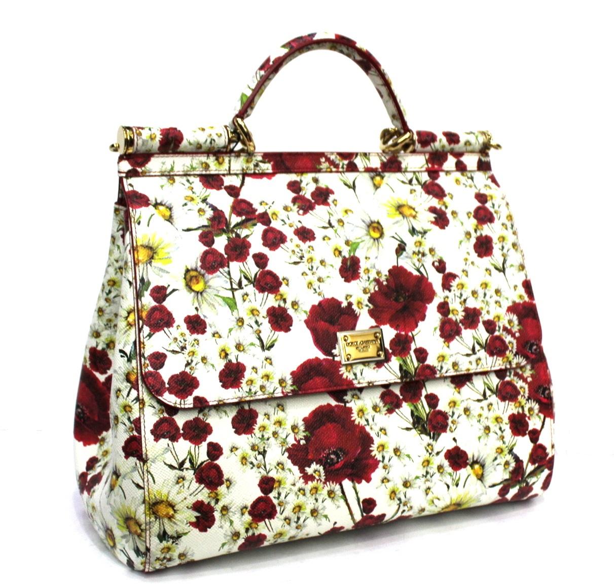 D&G Sicily model bag made of white flowery leather.

Equipped with handle and shoulder strap. Comfortable and capacious.

Very good condition.