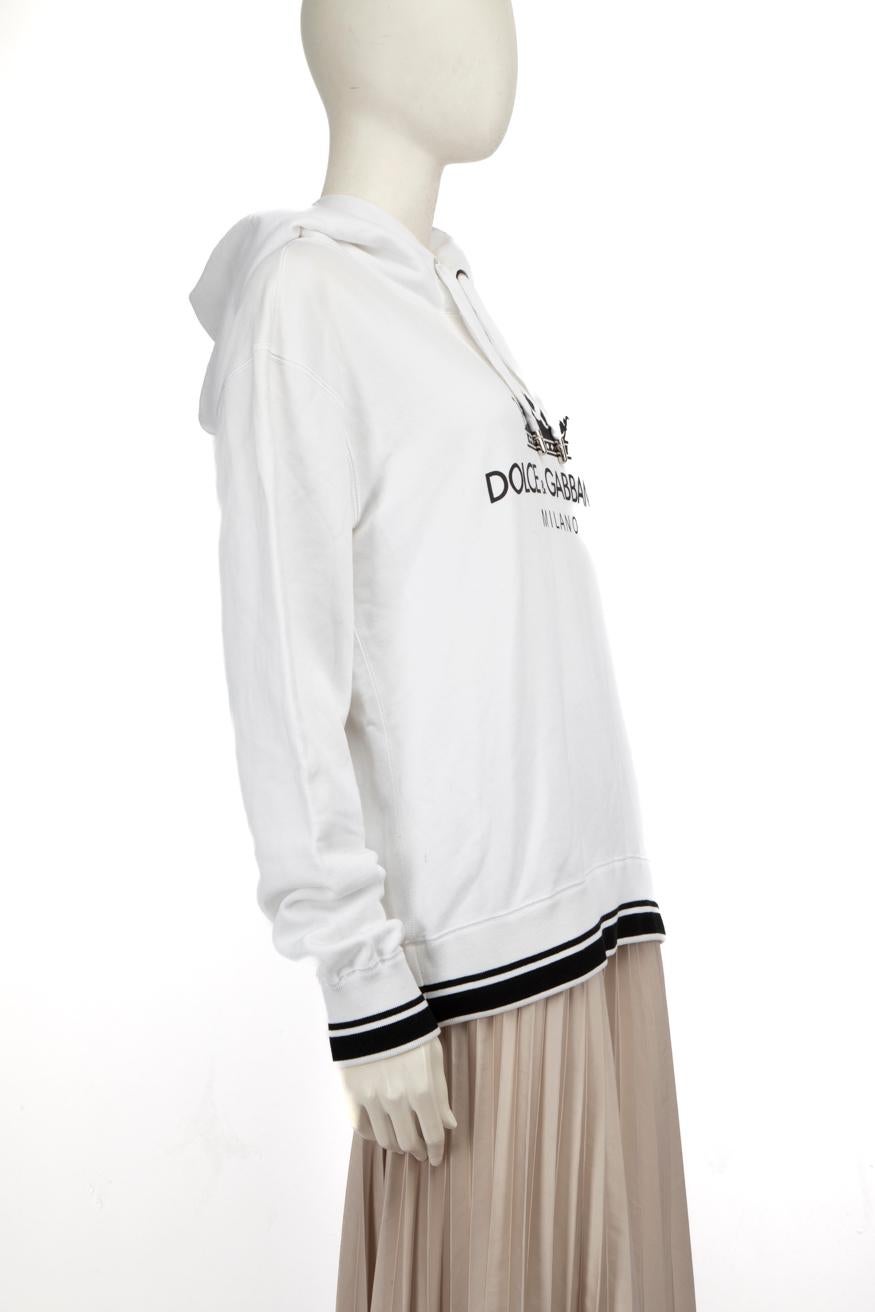 CONDITION is Good. Minor wear to the hoodie is evident, there is discolouration on the internal neckline, the edge of the hood, the inside of the hood and the back of the right sleeve. The front of the hoodie has a small mark near the logo on this