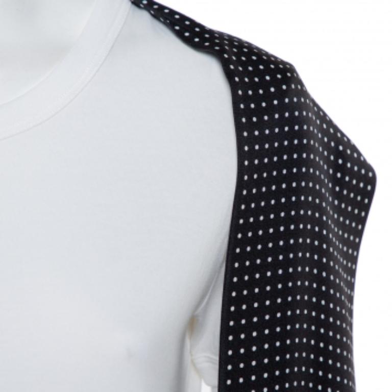 Dolce & Gabbana adds a polka dot scarf to a simple white T-shirt to create this unique design. The women's T-shirt is made from cotton and it has short sleeves, a round neckline, and a comfortable fit.
