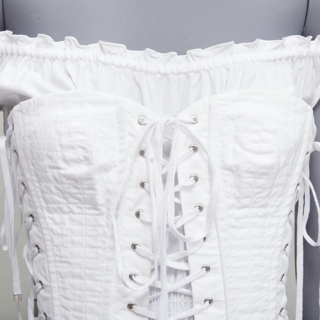 DOLCE GABBANA white cotton silver eyelet corset lace up layered top IT36 XXS
Reference: TGAS/D00417
Brand: Dolce Gabbana
Designer: Domenico Dolce and Stefano Gabbana
Material: Cotton
Color: White, Silver
Pattern: Solid
Closure: Lace Up
Lining: White