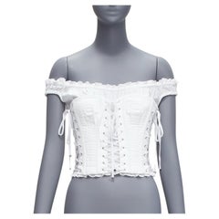 DOLCE GABBANA - Haut à lacets et œillets en coton blanc avec coutures superposées IT36 XXS
