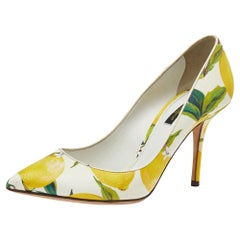 Dolce & Gabbana Weiße spitz zulaufende Lederpumps mit Blumendruck Größe 38