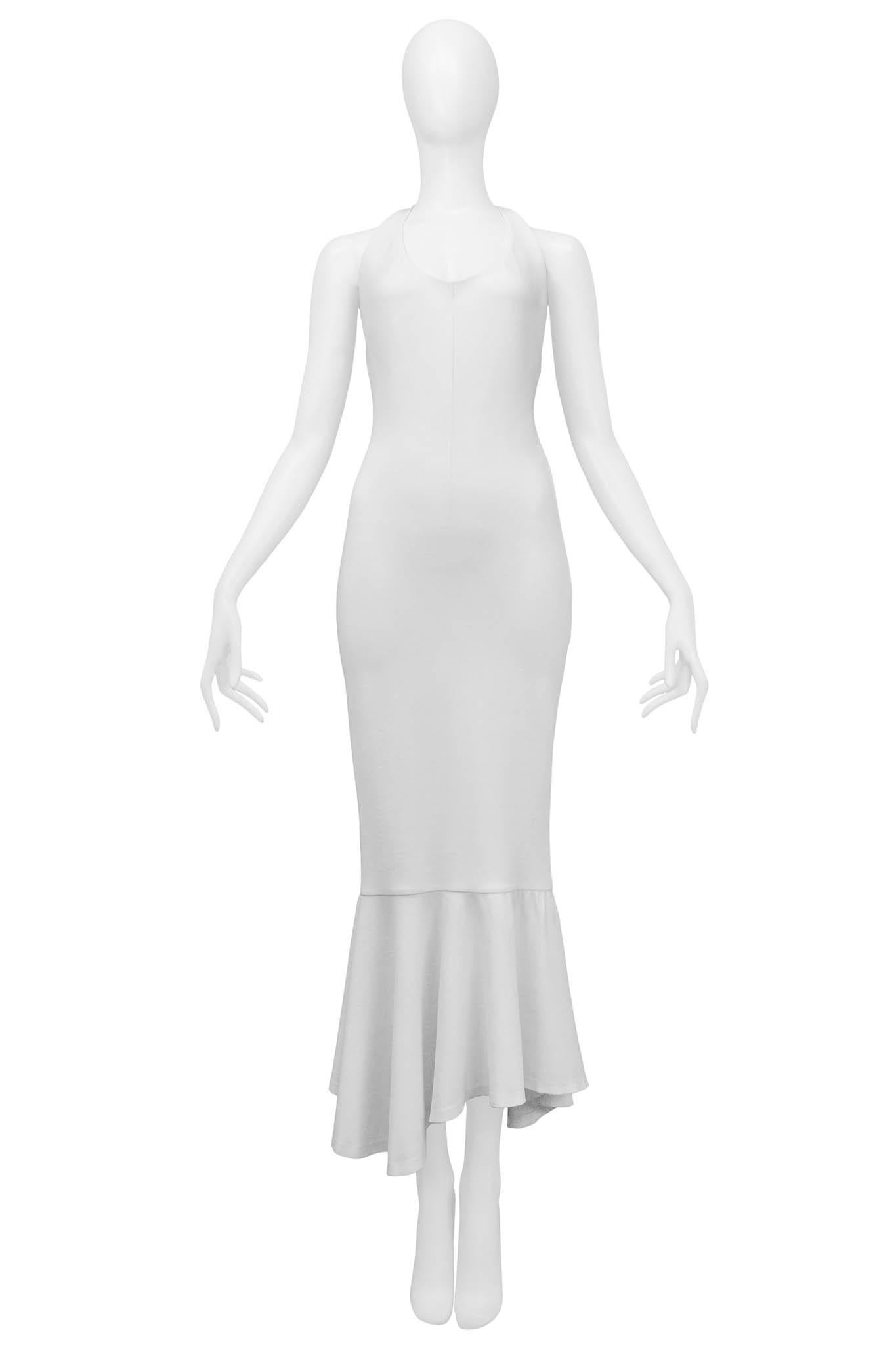 Resurrection Vintage is excited to offer a vintage Dolce & Gabbana white halter dress, featuring an asymmetrical ruffle hem, halter front that ties at the back neckline, and an invisible zipper down the back.

Dolce & Gabbana
Size 44
Rayon, Nylon,