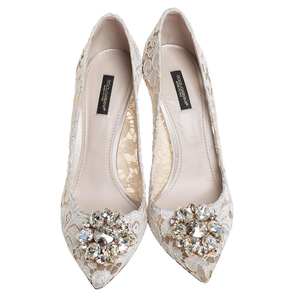 Dolce & Gabbana's range pays tribute to Italian craftsmanship. These Taormina pointed-toe pumps rendered in delicate lace evoke the brand's feminine elegance and are adorned with sparkling well-cut crystal embellishments on the uppers for an opulent