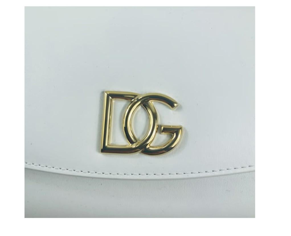 Dolce & Gabbana White Millennials Calfskin bag shoulder / cross body bag
Golden colour strap 
DG logo
100% Vitello 
Size: 20x13cm
Made in Italy 
Brand new with the box and tags!