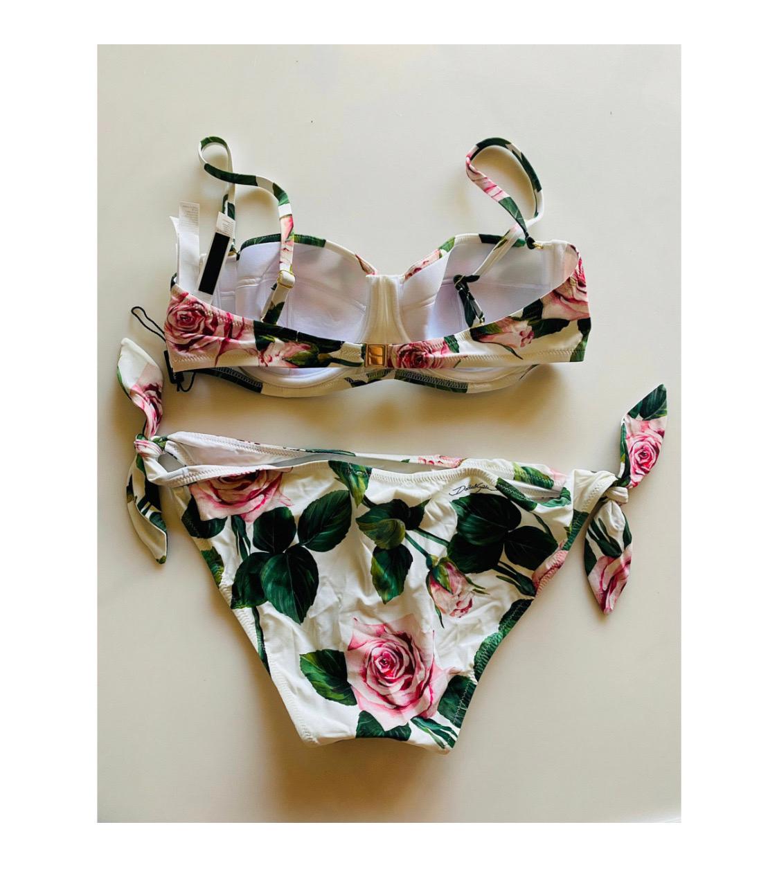 Dolce & Gabbana timeless
balconette bikini top and bottoms set
in fine fabric comes in TROPICAL
ROSE print and is perfect for
enhancing every woman’s femininity:

- Bra with padded cups and wiring

- Adjustable bows on the sides

- Rear branded