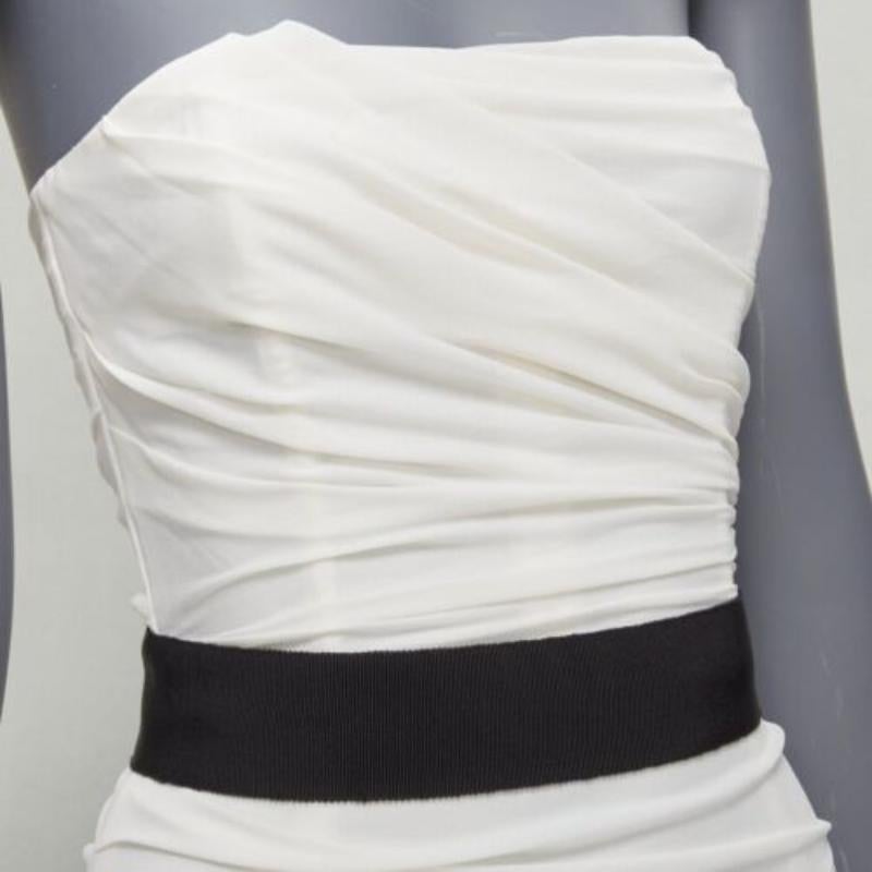 DOLCE GABBANA white silk blend ruched strapless corset dress IT36 XXS
Reference: SNKO/A00280
Brand: Dolce Gabbana
Designer: Domenico Dolce and Stefano Gabbana
Material: Silk, Blend
Color: White, Black
Pattern: Solid
Closure: Zip
Lining: White