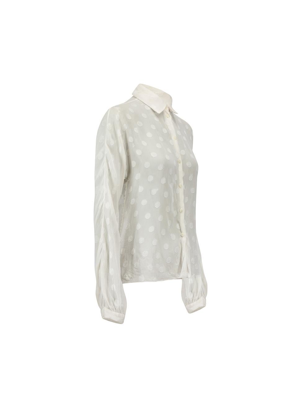 CONDITION is Very good. Minimal wear to blouse is evident. Minimal discolouration and slight loose threads along embroidered circles on this used Dolce & Gabbana designer resale item.





Details


White

Silk

Blouse

Sheer

Polkadot pattern

Long