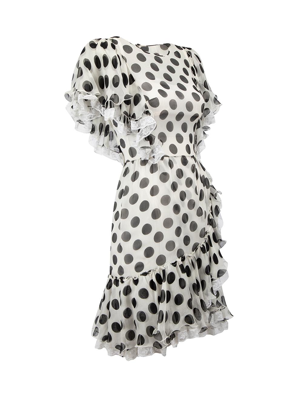 CONDITION is Very good. Minimal wear to dress is evident. Minimal discolouration on tulle of ruffle detail on this used Dolce & Gabbana designer resale item. Slip dress included.



Details


White and black

Silk

Dress

Polkadot pattern

Round