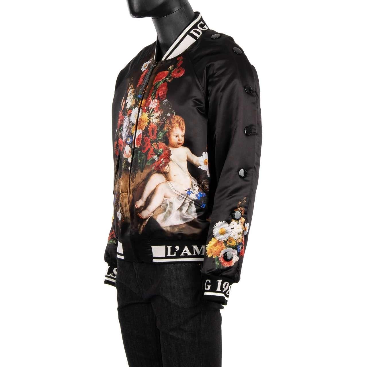 - Wide Fit, Baroque stuffed jacket with angel and flowers print in black by DOLCE & GABBANA - New with tag - Wide cut - MADE IN ITALY - Model: G9MQ0T-HPM94-HNT85 - Material: 100% Polyester - Lining: 100% Nylon - Knitwear applications: 96% Silk, 4%