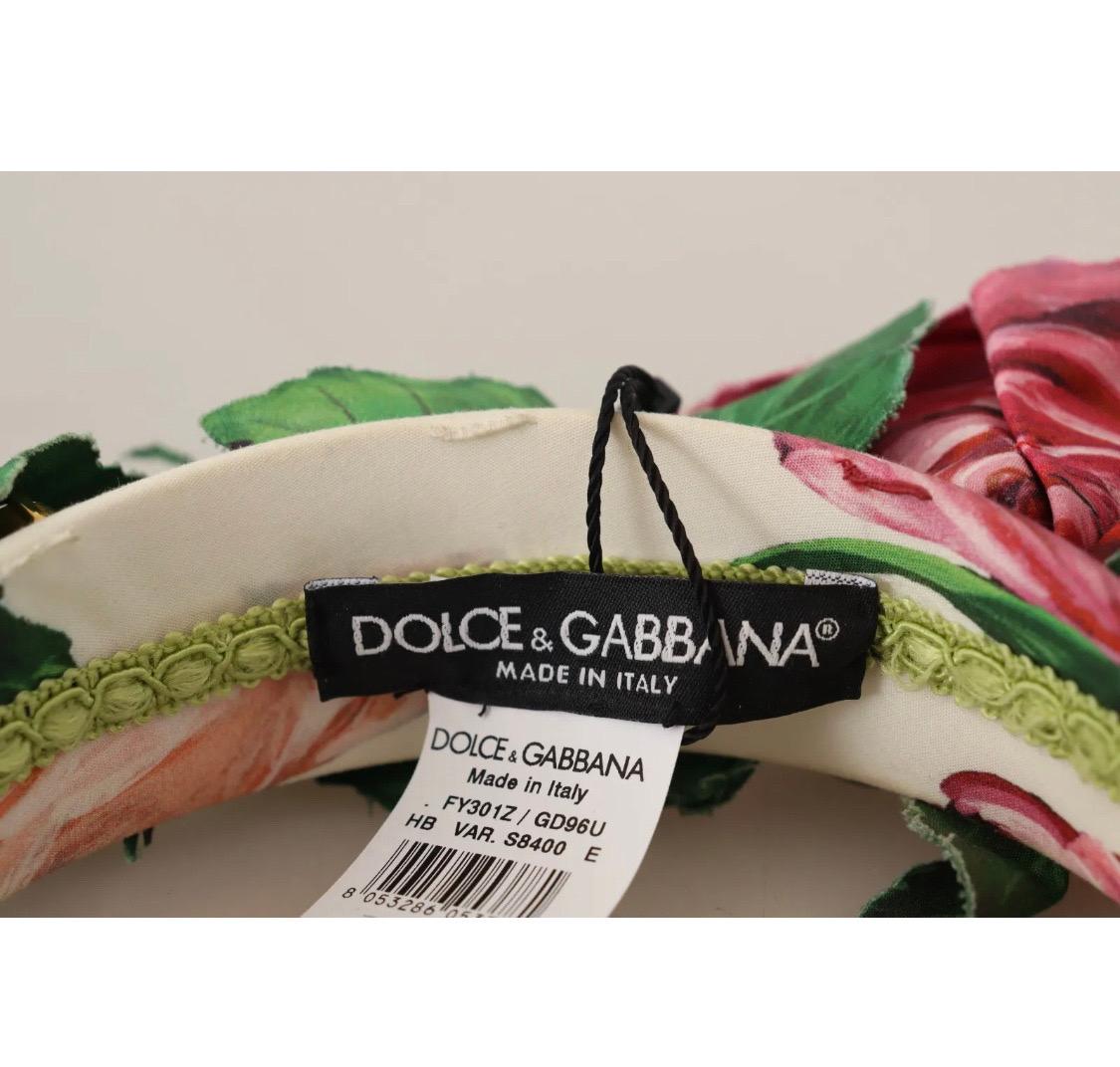 DOLCE & GABBANA

Absolutely stunning, 100% Authentic, brand new with tags Dolce & Gabbana wide headband. Domenico Dolce and Stefano Gabbana maxed out its brightness with voluminous roses surrounded by foliage. They are supported by large sparkling