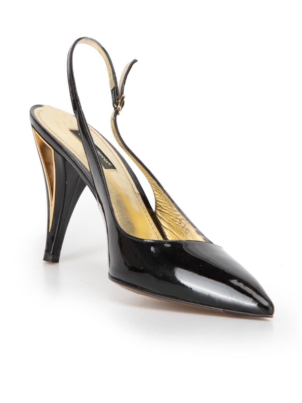 CONDITION is Very good. Minimal wear to heels is evident. Minimal wear to the patent exterior where faint marks and scuffs can be seen on this used Dolce & Gabbana designer resale item. 
 
 Details
  Black
 Patent leather
 Slingback heels
 Pointed