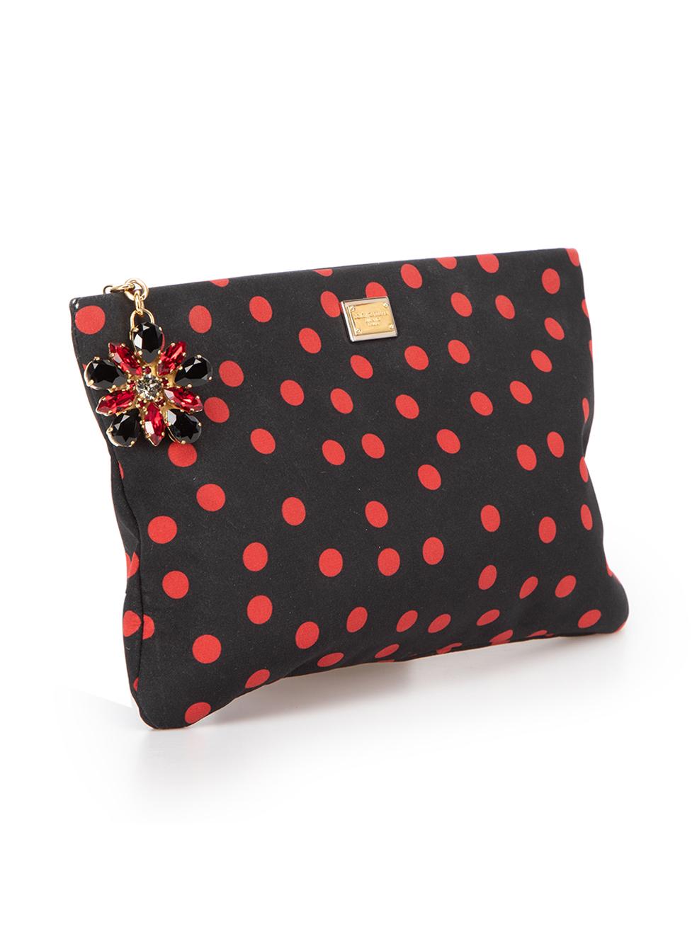 CONDITION is Very good. Hardly any visible wear to clutch is evident on this used Dolce & Gabbana designer resale item.



Details


Black

Cloth

Red polka-dots

Zip closure with crystal flower embellishment

1x Main compartment

1x Internal zip