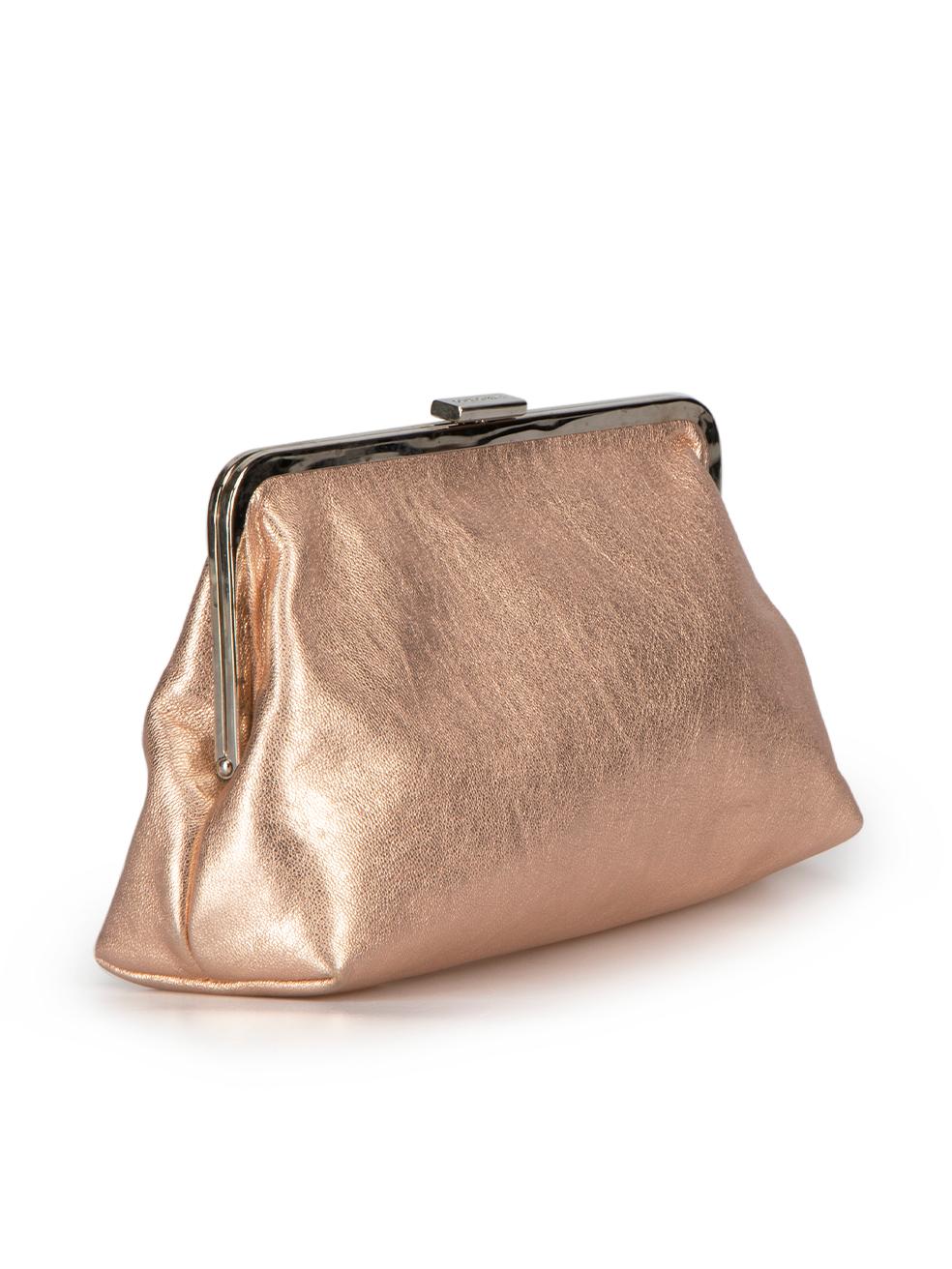 CONDITION is Very good. Minimal wear to bag is evident. Minimal wear to the metal trim with tarnish spots. There are also scuff marks to the base, corners and rear on this used Dolce & Gabbana designer resale item.



Details


Pink