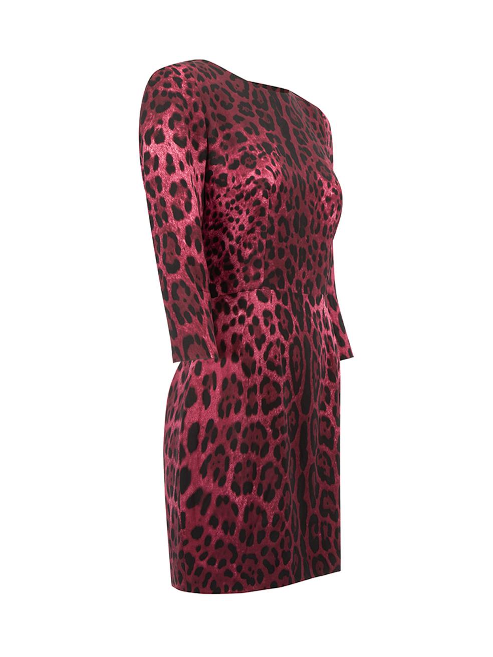 CONDITION is Very good. Hardly any visible wear to dress is evident. There is a sticky stubstance near the neckline on this used Dolce & Gabbana designer resale item.   Details  Purple Silk Mini dress Leopard pattern Round neckline 3/4 sleeves Back