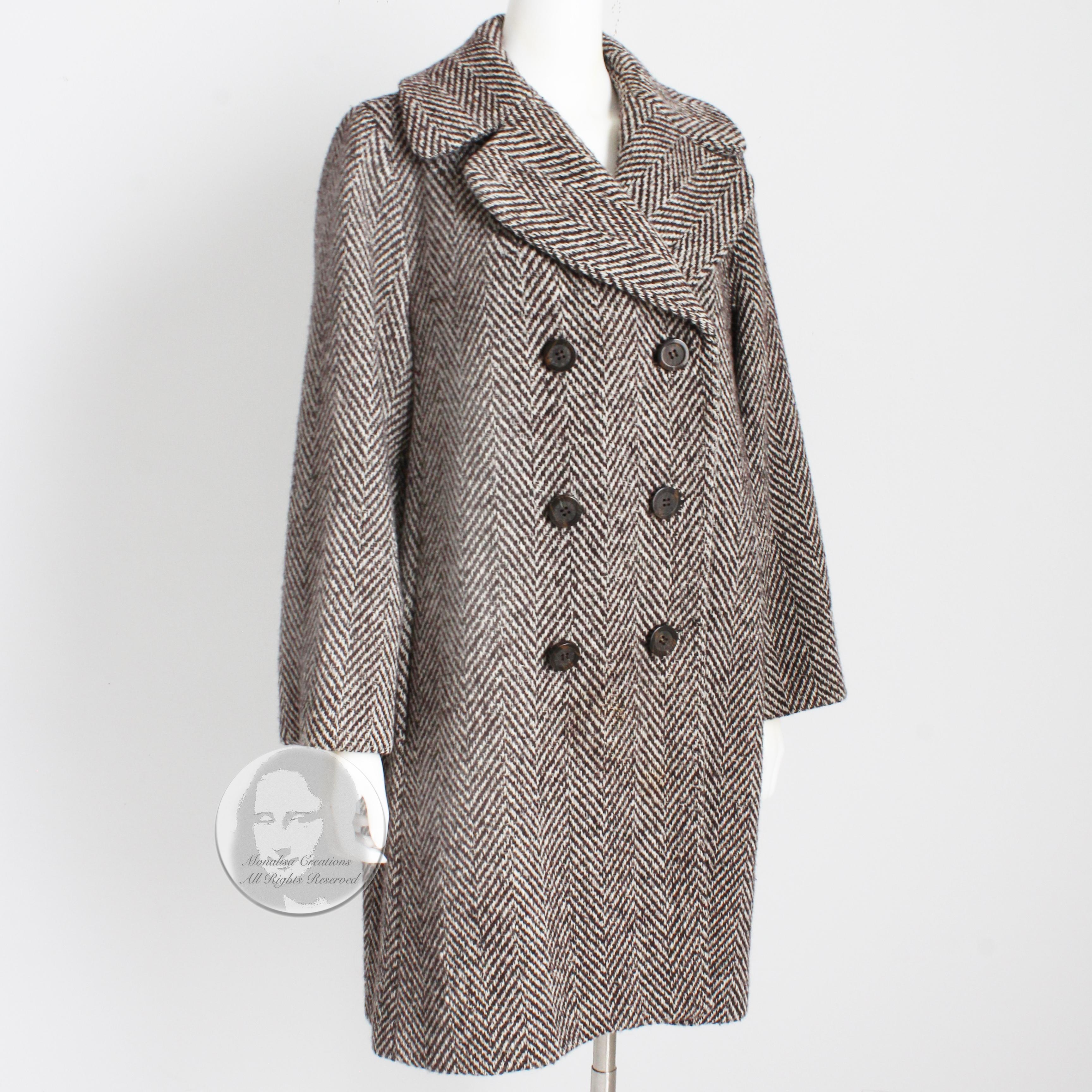 Here's a chic wool coat from Dolce & Gabbana, most likely made in the mid 2000s.  Made from a soft brown and cream white herringbone wool, it features double-breasted construction, side pockets, chunky buttons and is fully-lined in satin leopard