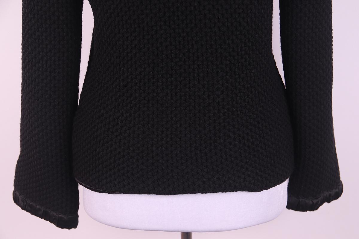 Chanel Black Peplum Tweed Jacket 

Colour: Black
Season: All
size 42

The condition is very good, there may be minor pellets.

it consists of wool and silk


Details

• Long sleeves
• Pockets with flaps

 Made in Italy