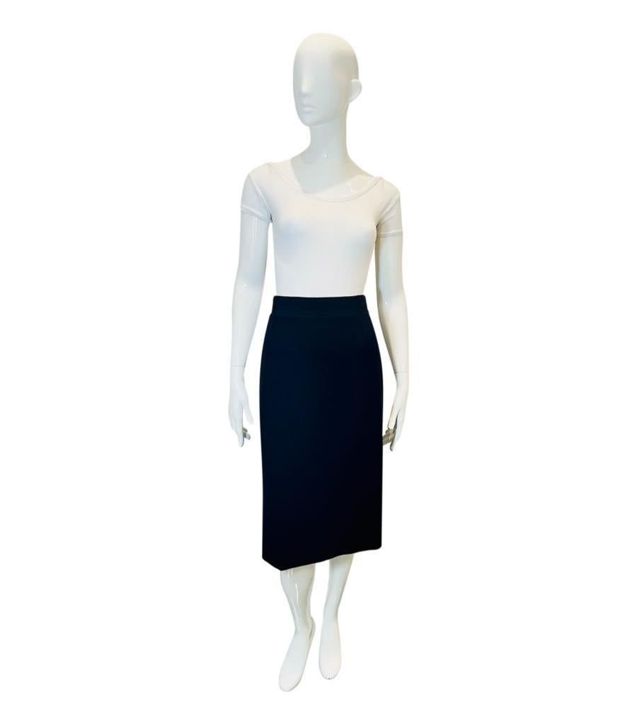 Dolce & Gabbana Wool Pencil Skirt
Black classy pencil skirt detailed with elasticated waist band.
Featuring zip closure to rear and knee-length.
Size – 42IT
Condition – Very Good
Composition – 92% Virgin Wool, 4% Elastane, 4% Nylon