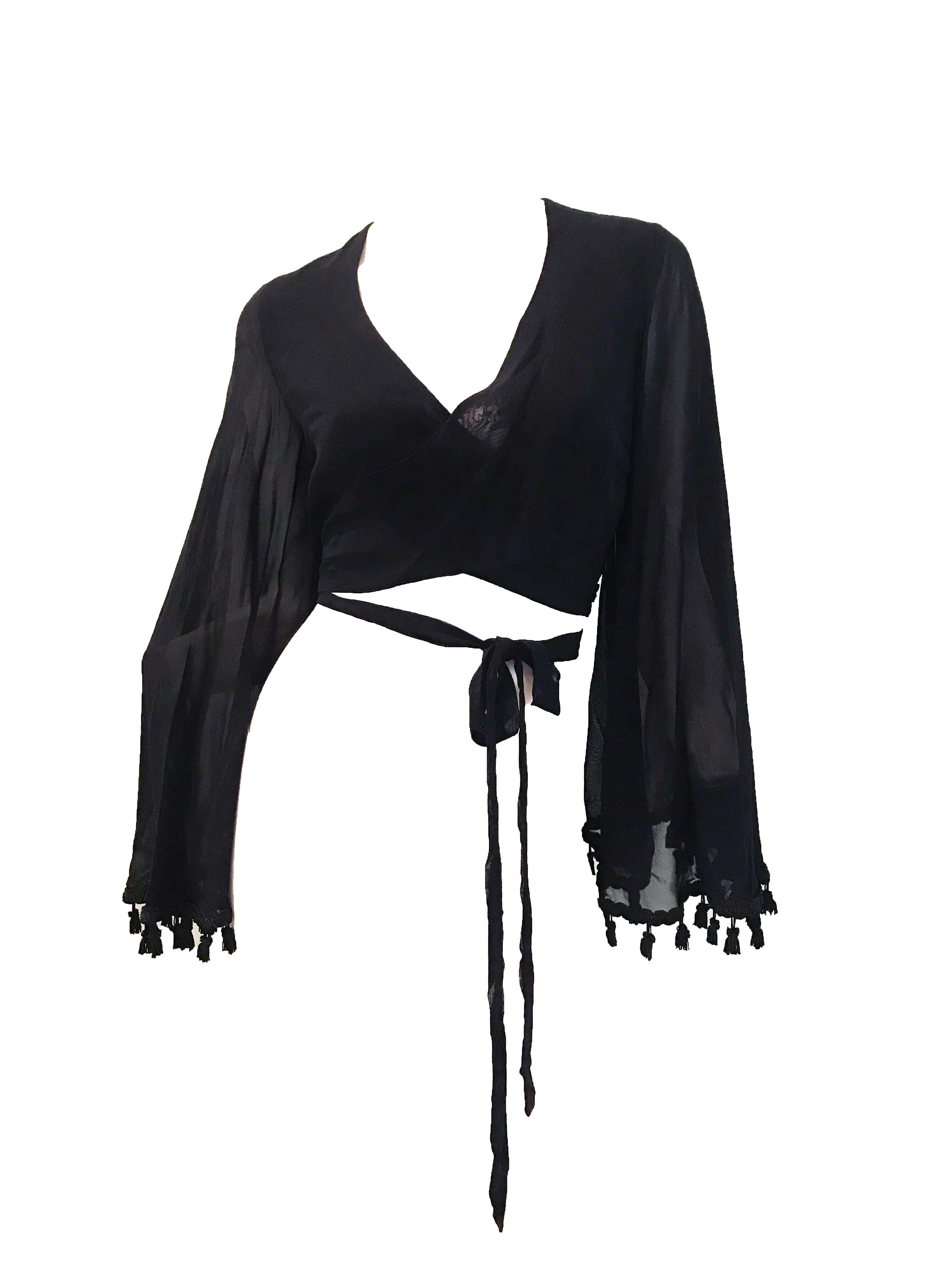 Dolce & Gabbana black sheer wrap top with tassel cuffs. 

Condition: Excellent
34