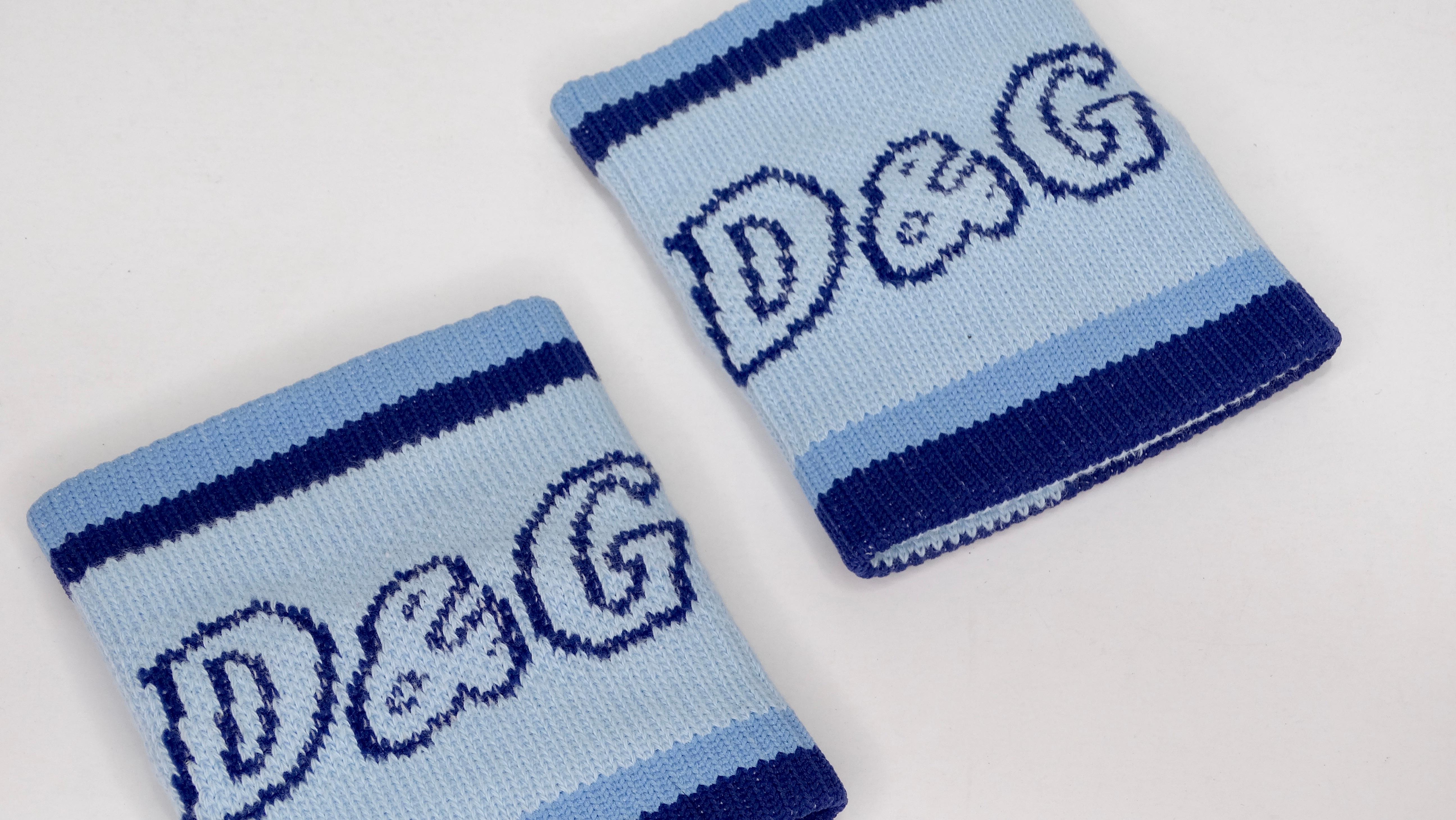 Circa early 2000s, these Dolce & Gabbana wrist sweat bands are the most iconic accessory for your look! Two tone blue fabric printed with the D&G logo on the front. Perfect to layer with your favorite bracelets, these will pair great with your