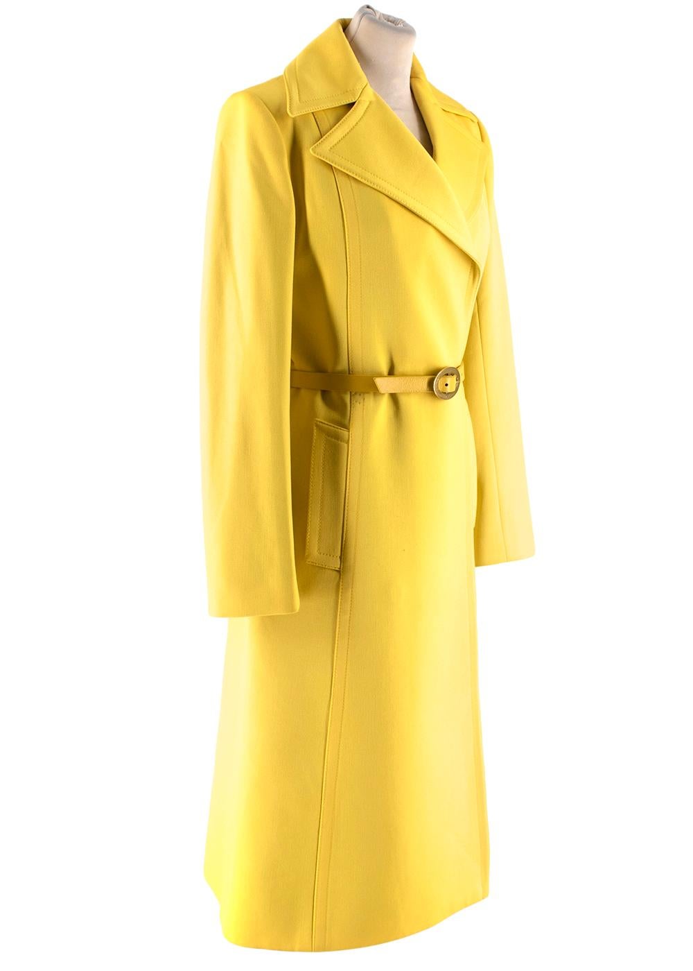 Dolce & Gabbana Yellow Belted Virgin Wool & Cashmere Coat

- Classic Trench Coat Style 
- x2 Outer Side Pockets 
- Silver Hardware Detail 
- Oversize Collared Detail 
- Yellow Leather Belt 

Made in Italy 

Length - 109cm
Sleeve - 61cm
Chest - 38cm