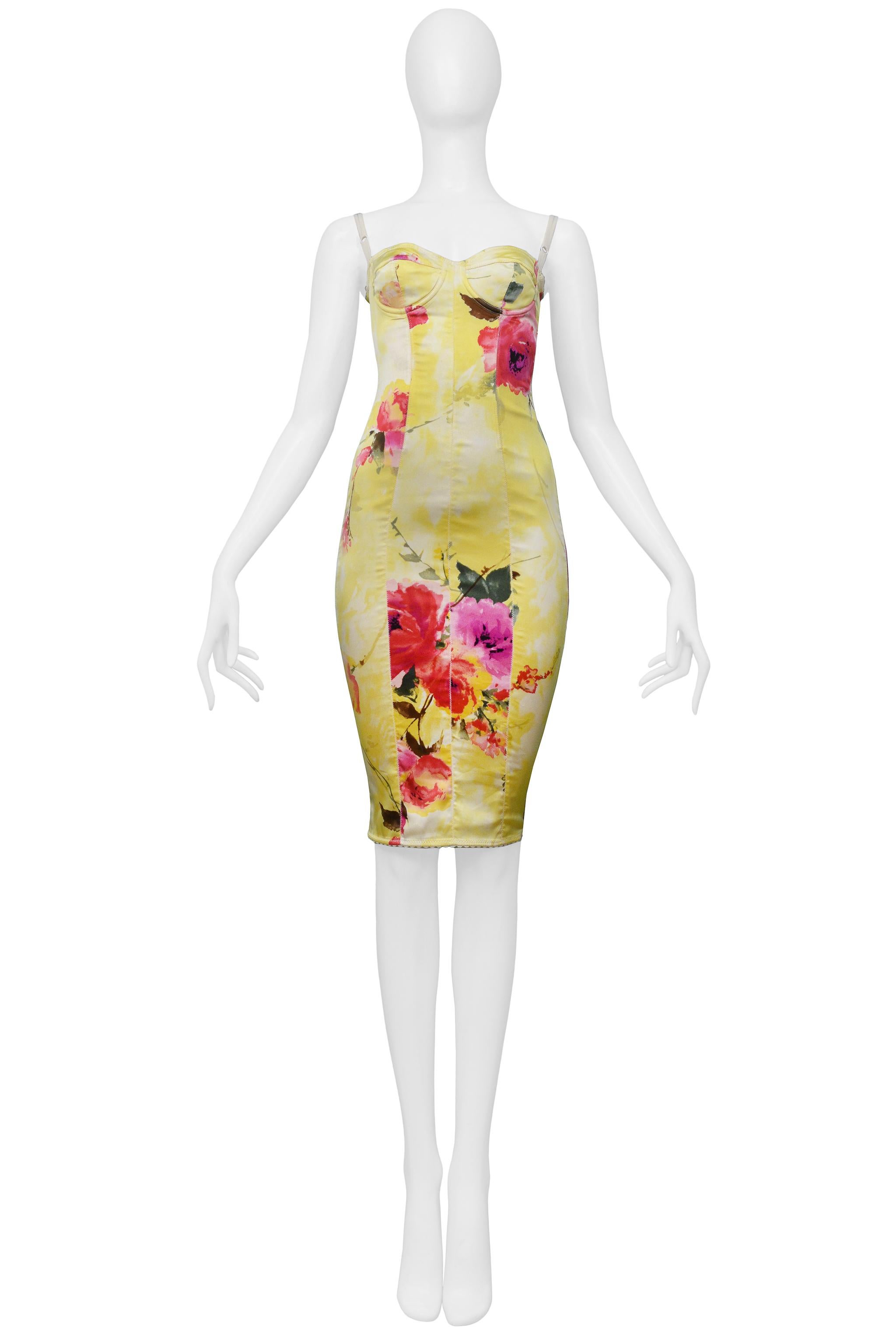 Resurrection Vintage is excited to offer a vintage Dolce & Gabbana yellow stretch satin body-con bustier dress featuring a pink and red floral print, off-white adjustable straps, fitted body, hook and eye center back closure. 

Dolce & Gabbana
Size